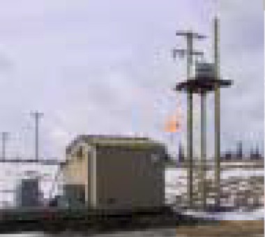 Chevron Simonette well site — remote oil well with service transformer and VSD enclosure
